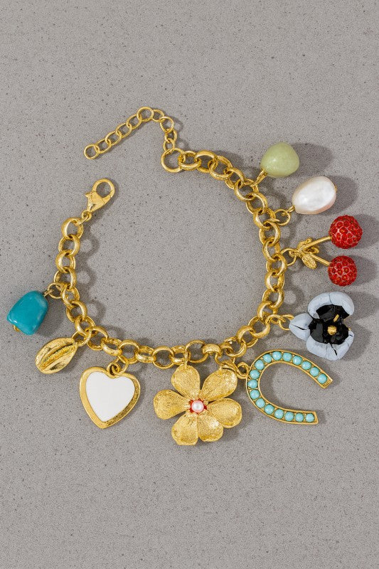 Brazalete de baño de oro con detalles coloridos