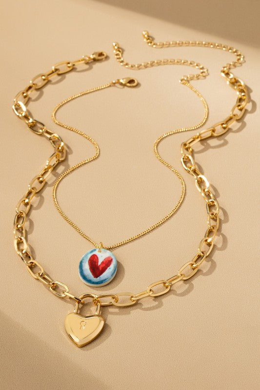 Duo de Collares de corazón de cerámica y baño de oro